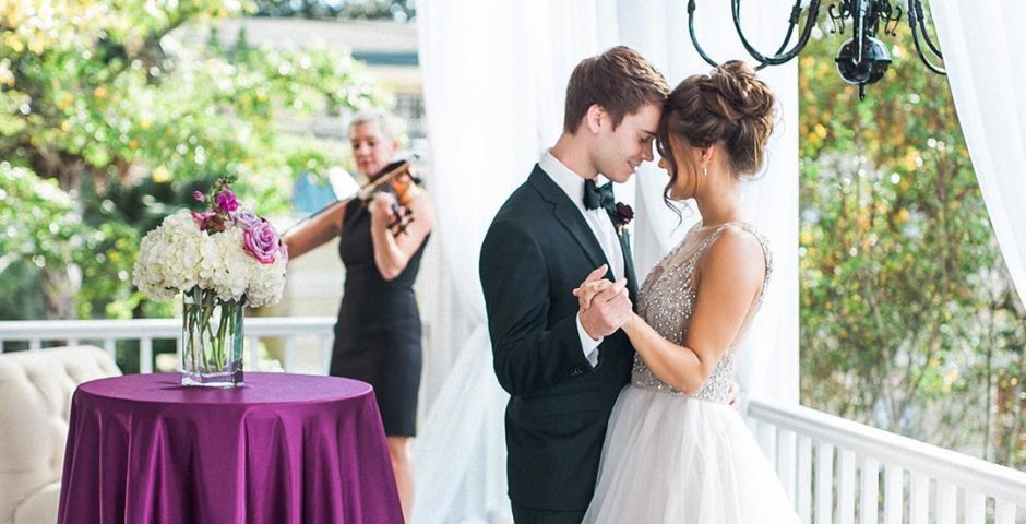 Bride and groom's first dance with professional violinist